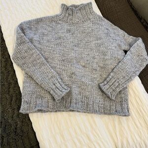 Cable knit mock neck sweater